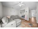 Inviting living room featuring a comfortable sectional sofa and open dining area at 740 Tavern Ct # 7, Rock Hill, SC 29732