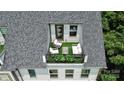 Rooftop terrace with outdoor furniture and greenery, offering a private escape with city views at 11043 Stetler St, Charlotte, NC 28204