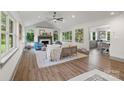 Bright living room with fireplace, large windows, and an open floor plan at 120 Pinewood Ln, Rock Hill, SC 29730