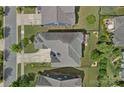 An aerial view of the property shows its layout, manicured backyard, neighboring houses, and proximity to the street at 12214 Bonny Oaks Dr, Cornelius, NC 28031