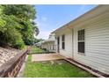 Fenced backyard with a patio providing a private outdoor space for relaxation and entertainment at 207 Crystal Springs Ln, Shelby, NC 28150