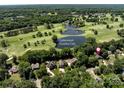 Scenic aerial shot of Cedarwood Country Club homes nestled among the trees and golf course at 3531 Bon Rea Dr, Charlotte, NC 28226