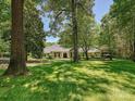 Lush trees shade this home with meticulous landscaping, creating a serene, and private oasis at 643 Baron Rd # 8, Waxhaw, NC 28173