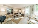 Cozy living room featuring neutral decor and plenty of natural light at 9920 White Cascade Dr, Charlotte, NC 28269