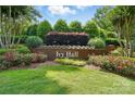 Landscaped brick sign at the entrance to the Ivy Hall community at 10607 Newberry Park Ln, Charlotte, NC 28277