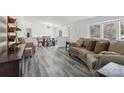 Open-concept living room flowing into the dining area, featuring modern floors and neutral decor at 2315 Circle Dr, Great Falls, SC 29055