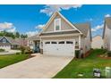 Beautiful house with two car garage and well-manicured front yard at 620 River Birch Dr, Salisbury, NC 28146