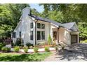 Lovely painted-brick home with dark-trimmed windows, lush landscaping, and inviting curb appeal at 6639 Camp Creek Rd, Lancaster, SC 29720