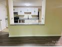 Bright kitchen with modern appliances, granite countertops, and ample cabinet space at 9541 Shannon Green Dr # C, Charlotte, NC 28213
