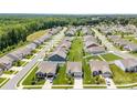 Panoramic aerial view of a well-planned residential community with lush green lawns and orderly street layout at 128 Asher Ln, Mooresville, NC 28115