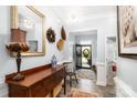 Inviting foyer with stylish decor, hardwood floors, and a view of the front door at 128 Asher Ln, Mooresville, NC 28115