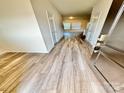 Welcoming entryway boasting wood-look flooring and a view into the open-concept living space at 1510 Old Rivers Rd # 171, Concord, NC 28027