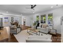 Bright and spacious living room with hardwood floors, neutral decor, and an open layout at 1922 Thomas Ave, Charlotte, NC 28205