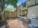 View of the backyard with a privacy fence and a small patio area perfect for outdoor seating at 2324 Brookview Ct, Rock Hill, SC 29732