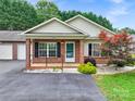 Inviting brick home with a cozy front porch at 2561 26Th Ne Ave, Hickory, NC 28601