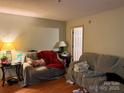 Inviting living room with hardwood flooring, neutral paint and 2 couches at 508 Hillcrest St, Marshville, NC 28103
