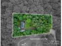 Aerial view of a wooded lot showcasing the approximate lot lines and surrounding trees at 6903 Knottywood Ln # 21, Vale, NC 28168