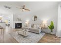 Bright living room with hardwood floors, a fireplace, and contemporary decor at 1123 Market St, Fort Mill, SC 29708