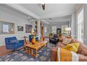 Bright and spacious living room with hardwood floors, elegant furnishings, and plenty of natural light at 2009 Waterbury Ln, Waxhaw, NC 28173