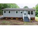 Charming one-story home with newly landscaped front yard and inviting entrance at 2980 N Church St, Claremont, NC 28610