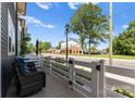 Cozy front porch featuring comfortable seating and a view of the street, perfect for relaxing outdoors at 5481 Comiskey Aly, Kannapolis, NC 28081