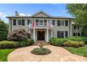 Elegant home with a stone walkway and manicured landscaping at 640 Colville Rd, Charlotte, NC 28207