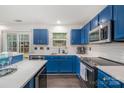Charming kitchen with white subway tile backsplash and stainless steel appliances at 9524 Eagle Feathers Dr, Charlotte, NC 28214