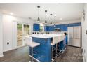 Kitchen with an island bar and stainless steel appliances at 9524 Eagle Feathers Dr, Charlotte, NC 28214
