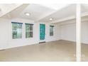 Spacious living room with bright white walls, multiple windows, and plenty of natural light at 10 Cedarvilla Dr, Rock Hill, SC 29730