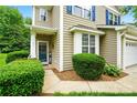 Charming home entrance with a teal door, neat landscaping, and tasteful exterior details at 147 Whitley Mills Rd, Fort Mill, SC 29708