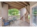 Outdoor balcony with seating and a staircase at 635 Portside Dr, Davidson, NC 28036