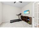 Bedroom featuring plush carpeting, TV, storage, and plenty of natural light at 1022 Hinson Forest Rd, Monroe, NC 28110