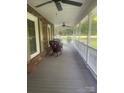 Inviting covered porch with rocking chairs, perfect for enjoying outdoor relaxation at 1619 Bellamy Cir, Albemarle, NC 28001