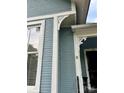 Detailed trim accents the exterior of this home, adding architectural charm at 308 W Monroe St, Salisbury, NC 28144