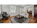 Bright living room featuring hardwood floors and a classic design at 361 5Th Nw St, Hickory, NC 28601