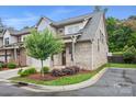 Beautiful home exterior featuring landscaped front yard and well-maintained brick facade on a sunny day at 5118 Waldron Meadow Dr, Charlotte, NC 28226