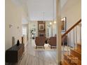 Staged living room showcasing a fireplace and light-filled space at 9121 Kings Canyon Dr, Charlotte, NC 28210