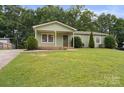 Charming single-story home with a well-manicured lawn and inviting front entrance at 918 Creekridge Dr, Monroe, NC 28110