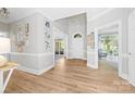 Bright foyer with gleaming floors, high ceilings, neutral walls, and views of the living areas at 1115 Maremont Ct, Matthews, NC 28104