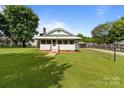 Lovely home with a green lawn and a detached garage in the back at 3345 Long Ferry Rd, Salisbury, NC 28146