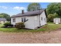 Showing the back of the house, a side entry, and storage shed at 1406 Upper Enochville Rd, Kannapolis, NC 28081