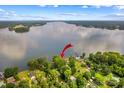 Scenic aerial view of the lakefront property, highlighting its proximity to the water at 270 Yachtsman Dr, Salisbury, NC 28146