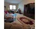 Spacious living room featuring neutral carpet and decor, perfect for Gathering gatherings at 600 Colby Cir, Salisbury, NC 28147