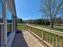 Outdoor living space shown on front porch at 1038 Gold Mine Dr, Catawba, NC 28609