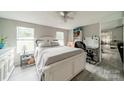 Bright bedroom with ample natural light, complemented by gray walls and white furniture, creating a serene atmosphere at 110 Crescent Heights Dr, Salisbury, NC 28146