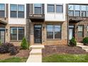 Charming exterior featuring a brick facade, modern windows, and inviting front entryway at 3737 S Tryon St, Charlotte, NC 28217