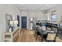 Well-lit open kitchen featuring stainless steel appliances and plenty of cabinet space at 482 New Bern Station Ct, Charlotte, NC 28209