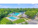 Community amenities include a large pool with lap lanes and a separate pool with a water slide at 9800 Walkers Glen Nw Dr, Concord, NC 28027