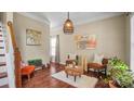 Comfortable living room showcasing modern decor, hardwood floors, and bright, airy atmosphere at 10306 Madison Park Dr, Charlotte, NC 28269