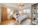 Bright bedroom featuring hardwood floors, natural light, ceiling fan, and comfortable furnishings at 1188 Rainbow Cir, Catawba, SC 29704